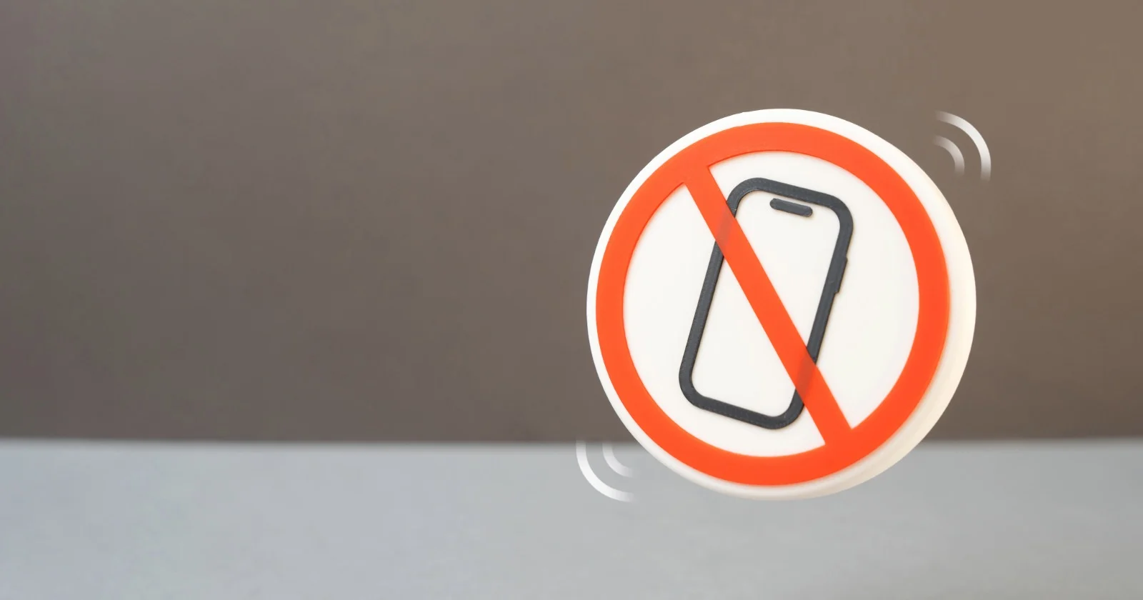 A North Carolina school that banned cell phones says students are happier and more talkative at home